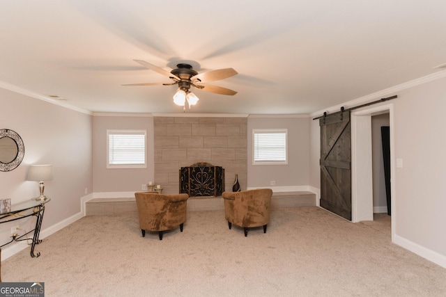 6914 N Baggett Rd, Douglasville, GA 30134 - sitting room featuring ornamental molding, carpet, a ceiling fan, and plenty of natural light
