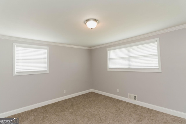6914 N Baggett Rd, Douglasville, GA 30134 - carpeted empty room with baseboards and ornamental molding