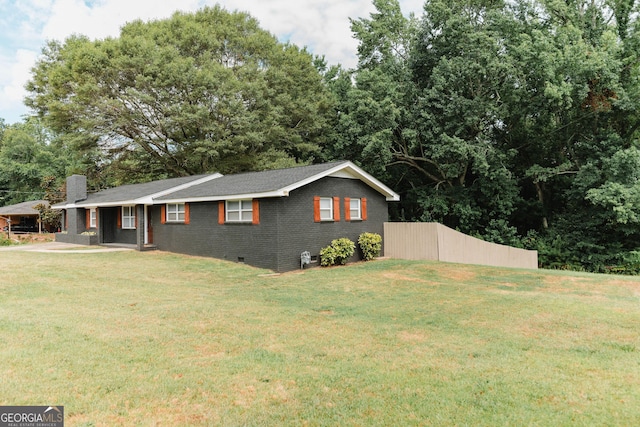 6914 N Baggett Rd, Douglasville, GA 30134 - view of front of property featuring a chimney, a front lawn, brick siding, and crawl space