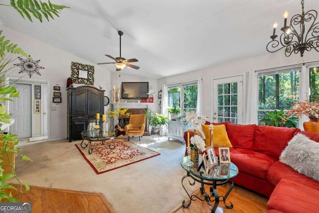 2030 Buford Dam Rd, Buford, GA 30518 - carpeted living area featuring lofted ceiling, a chandelier, and a ceiling fan