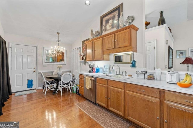 2030 Buford Dam Rd, Buford, GA 30518 - kitchen with dishwasher, a chandelier, light countertops, lofted ceiling, and brown cabinets