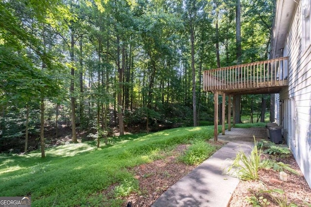 2030 Buford Dam Rd, Buford, GA 30518 - view of green lawn featuring a deck