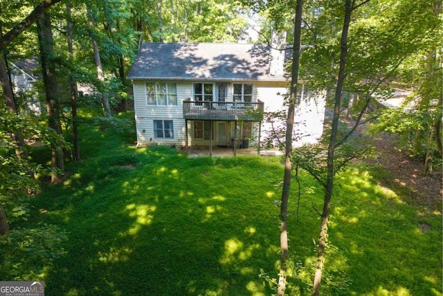 2030 Buford Dam Rd, Buford, GA 30518 - rear view of property with a wooden deck and a yard