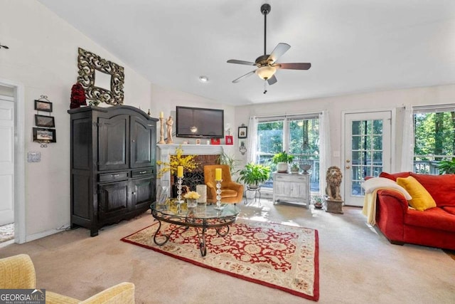 2030 Buford Dam Rd, Buford, GA 30518 - living area with light colored carpet, plenty of natural light, a ceiling fan, lofted ceiling, and a fireplace
