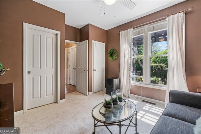 295 Sagamore Cv NW, Sugar Hill, GA 30518 - sitting room featuring carpet and a ceiling fan