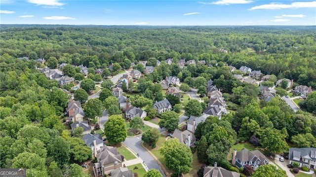 295 Sagamore Cv NW, Sugar Hill, GA 30518 - aerial view of property's location with a heavily wooded area and nearby suburban area
