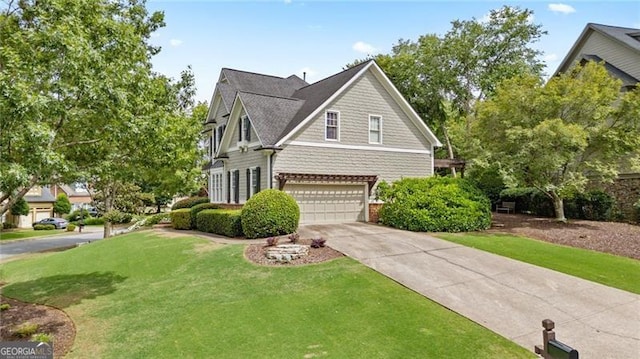 295 Sagamore Cv NW, Sugar Hill, GA 30518 - view of front facade featuring driveway, a garage, and a front yard