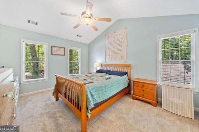 5055 Southland Dr, Woodstock, GA 30188 - bedroom with lofted ceiling, light colored carpet, and ceiling fan