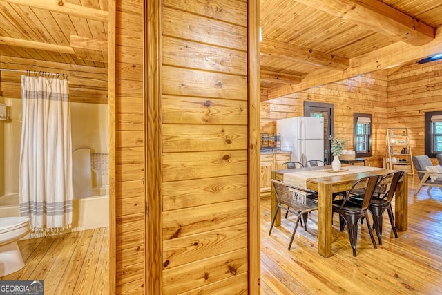 371 Abbott Top Rd, Ellijay, GA 30540 - dining area featuring a wood ceiling with exposed beams, light wood-style floors, and wood walls