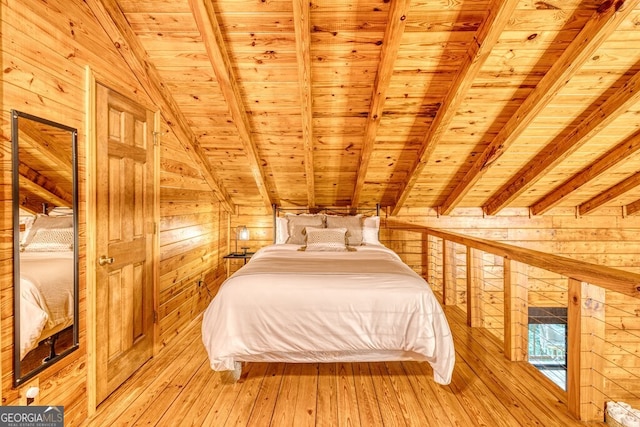 371 Abbott Top Rd, Ellijay, GA 30540 - bedroom with wooden walls, wooden ceiling, and light wood-style flooring