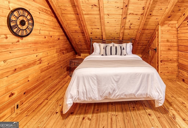 371 Abbott Top Rd, Ellijay, GA 30540 - bedroom with wooden ceiling, lofted ceiling, wooden walls, and hardwood / wood-style floors