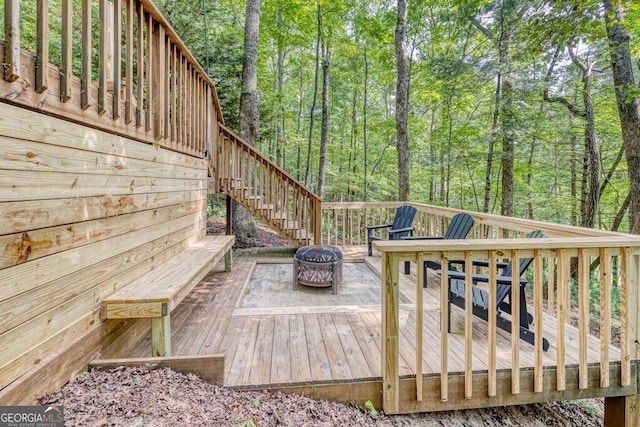 371 Abbott Top Rd, Ellijay, GA 30540 - wooden deck featuring a fire pit, stairway, and a forest view