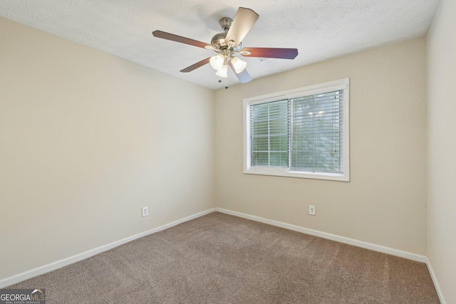 686 Shore Ln, Lithonia, GA 30058 - empty room featuring carpet floors and a ceiling fan