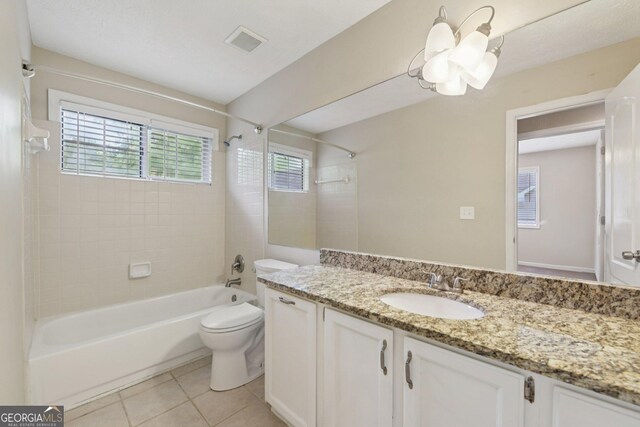 686 Shore Ln, Lithonia, GA 30058 - bathroom with washtub / shower combination, vanity, plenty of natural light, and tile patterned floors
