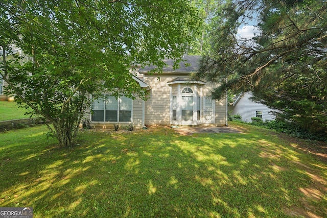 686 Shore Ln, Lithonia, GA 30058 - view of front of house featuring a front yard