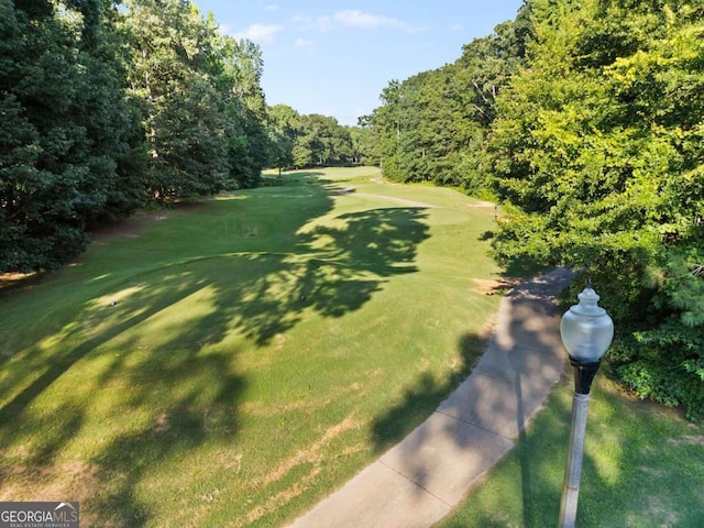 7198 Golfside Dr SE, Covington, GA 30014 - view of home's community featuring a view of trees and view of golf course