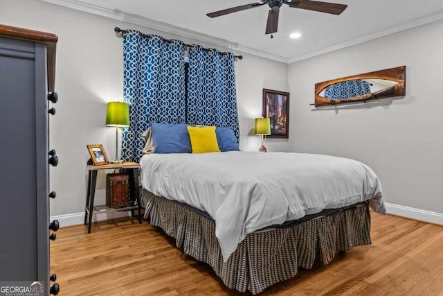 195 Sylvan Rd, Athens, GA 30606 - bedroom featuring crown molding, wood finished floors, recessed lighting, and a ceiling fan