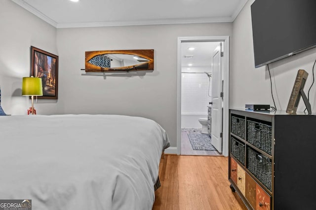 195 Sylvan Rd, Athens, GA 30606 - bedroom with light wood-type flooring, ornamental molding, connected bathroom, and recessed lighting