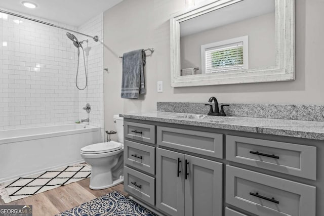 195 Sylvan Rd, Athens, GA 30606 - bathroom with vanity, wood finished floors, and bathtub / shower combination
