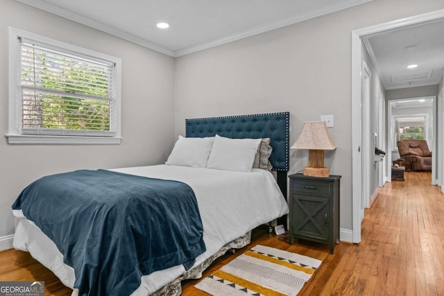 195 Sylvan Rd, Athens, GA 30606 - bedroom with light wood-style floors, crown molding, and recessed lighting
