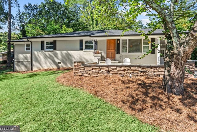 195 Sylvan Rd, Athens, GA 30606 - ranch-style house with a front yard, brick siding, and crawl space