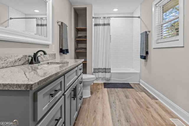 195 Sylvan Rd, Athens, GA 30606 - full bath featuring vanity, shower / bath combination with curtain, and wood finished floors