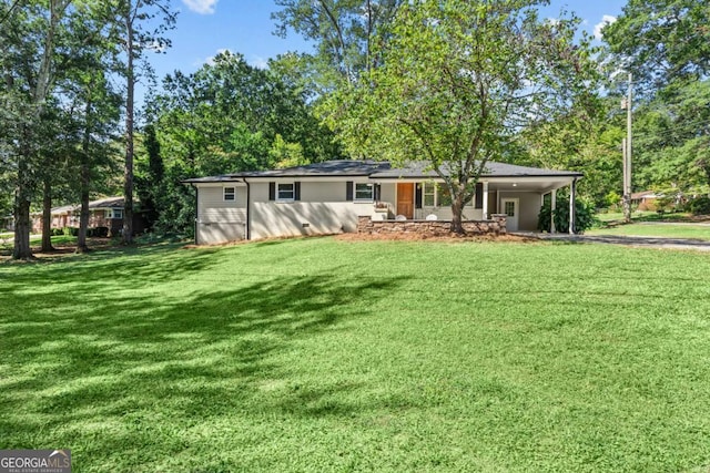 195 Sylvan Rd, Athens, GA 30606 - back of property with a lawn, an attached carport, a porch, and asphalt driveway