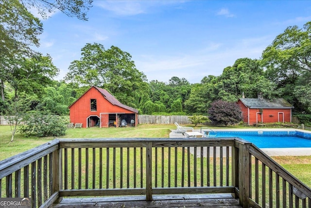 205 Cobb St, Palmetto, GA 30268 - wooden terrace featuring a barn and an outbuilding