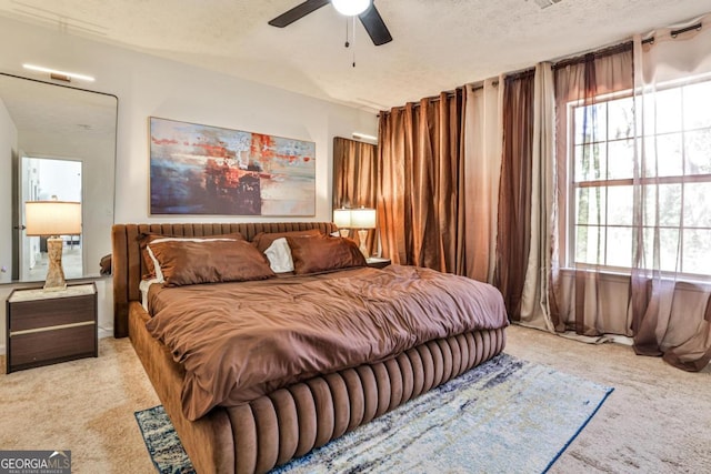 3915 Basil Way SW, Atlanta, GA 30331 - carpeted bedroom with a textured ceiling and a ceiling fan