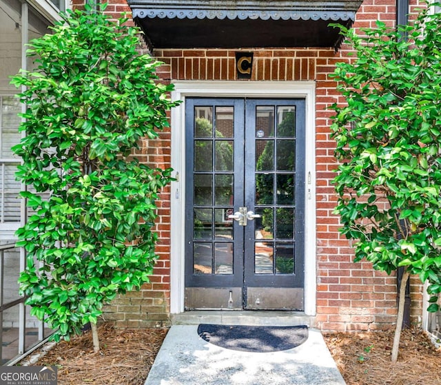 55 Delmont Dr NE Unit C3, Atlanta, GA 30305 - property entrance featuring french doors and brick siding
