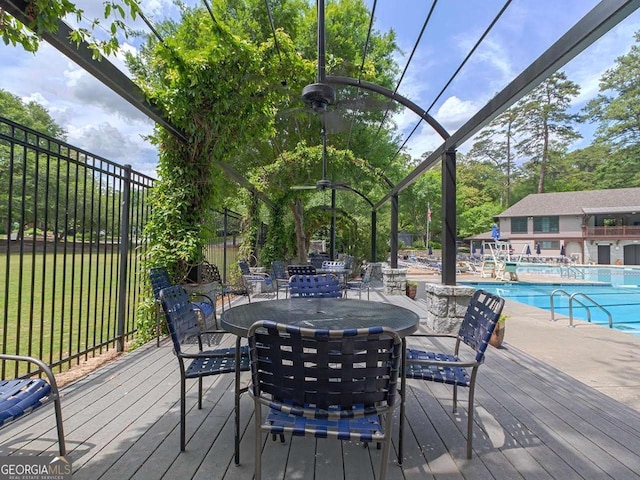 55 Delmont Dr NE Unit C3, Atlanta, GA 30305 - wooden terrace featuring a community pool, outdoor dining space, and a lawn
