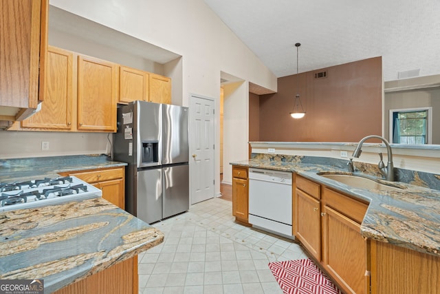 377 Avian Forest Dr, Stockbridge, GA 30281 - kitchen featuring stainless steel refrigerator with ice dispenser, dishwasher, light stone counters, lofted ceiling, and decorative light fixtures