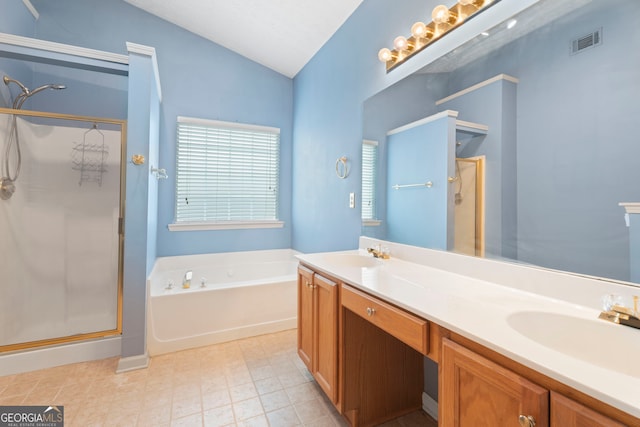 377 Avian Forest Dr, Stockbridge, GA 30281 - full bath with a stall shower, lofted ceiling, a garden tub, and double vanity