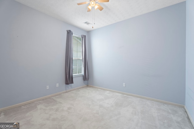 377 Avian Forest Dr, Stockbridge, GA 30281 - carpeted empty room featuring ceiling fan and a textured ceiling