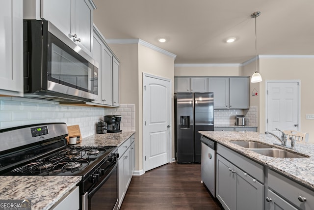 5804 Screech Owl Dr, Flowery Branch, GA 30542 - kitchen featuring stainless steel appliances, gray cabinetry, crown molding, light stone counters, and dark wood-style floors
