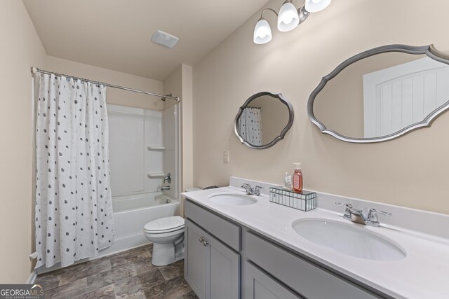 5804 Screech Owl Dr, Flowery Branch, GA 30542 - bathroom with shower / bathtub combination with curtain, double vanity, and stone finish flooring
