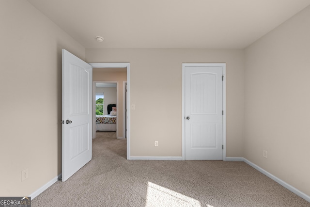 5804 Screech Owl Dr, Flowery Branch, GA 30542 - unfurnished bedroom with carpet and baseboards