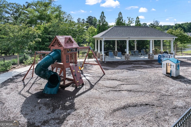 5804 Screech Owl Dr, Flowery Branch, GA 30542 - communal playground with a gazebo, view of wooded area, and a patio area