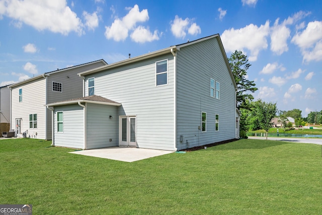 5804 Screech Owl Dr, Flowery Branch, GA 30542 - rear view of property featuring a lawn, a patio, and a water view