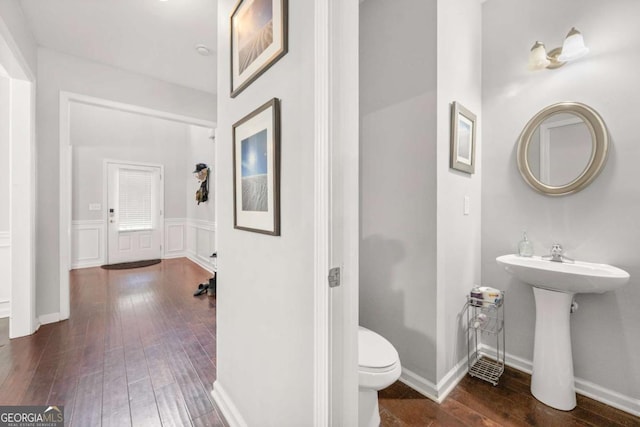 1871 Stoney Chase Dr, Lawrenceville, GA 30044 - bathroom featuring wood-type flooring and a wainscoted wall