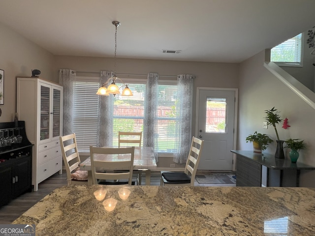 2481 Southhaven Ln, Buford, GA 30519 - dining area featuring wood finished floors