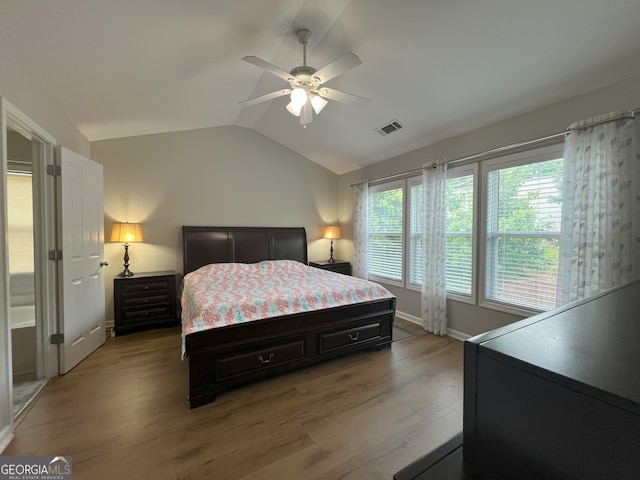 2481 Southhaven Ln, Buford, GA 30519 - bedroom with lofted ceiling, light wood-style flooring, and ceiling fan