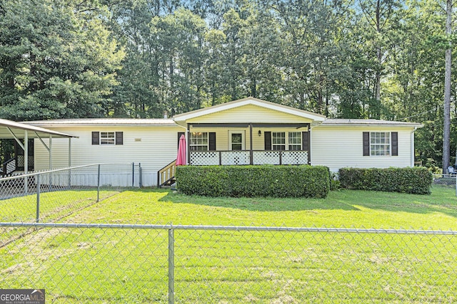 340 Loblolly Rdg, Locust Grove, GA 30248 - manufactured / mobile home with covered porch, a fenced backyard, and a metal roof