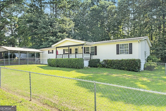 340 Loblolly Rdg, Locust Grove, GA 30248 - manufactured / mobile home with covered porch, a carport, and a fenced backyard
