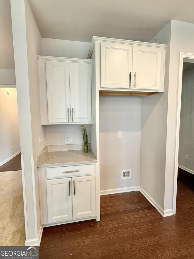 5599 Wheeler Ridge Rd, Auburn, GA 30011 - kitchen with white cabinetry and dark wood-style flooring