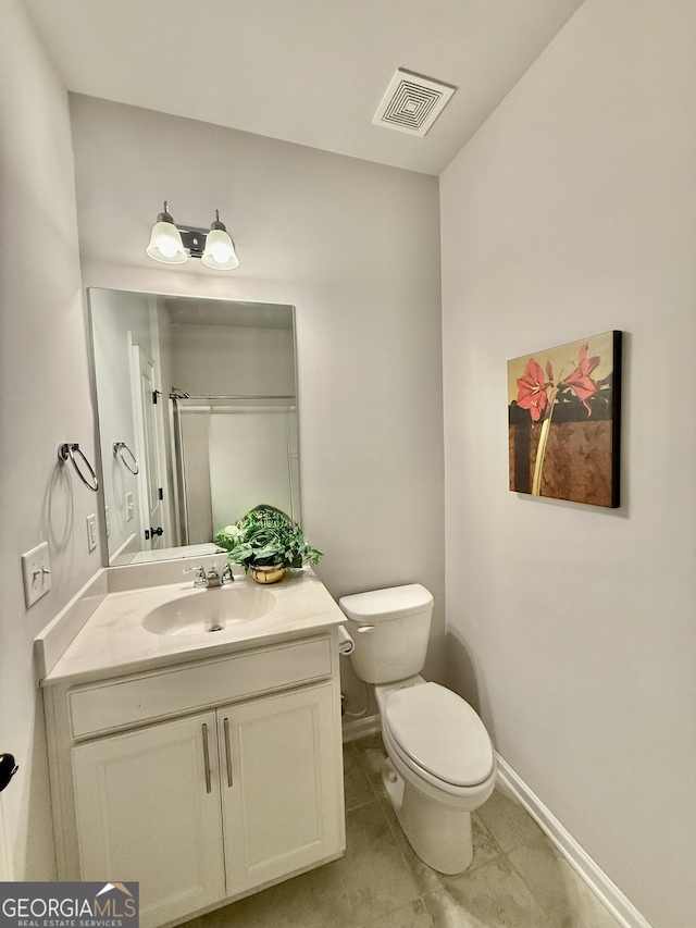 5599 Wheeler Ridge Rd, Auburn, GA 30011 - bathroom with vanity, tile patterned floors, and a shower