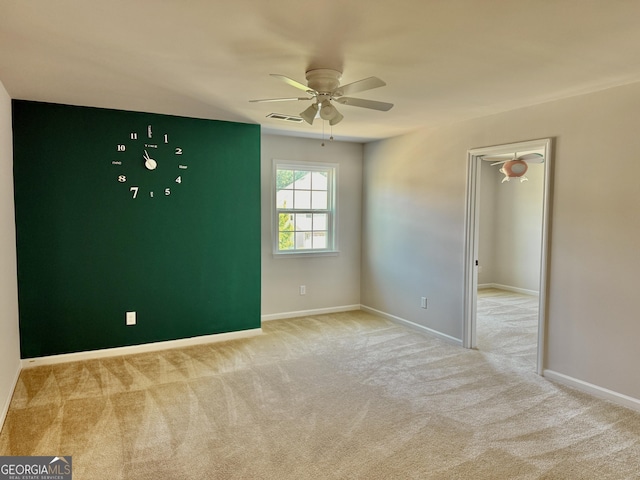 5599 Wheeler Ridge Rd, Auburn, GA 30011 - unfurnished room with carpet flooring and a ceiling fan