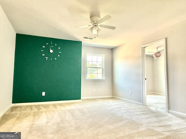 5599 Wheeler Ridge Rd, Auburn, GA 30011 - spare room with carpet flooring and ceiling fan