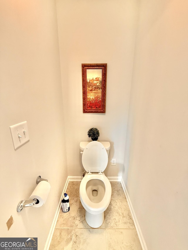 5599 Wheeler Ridge Rd, Auburn, GA 30011 - bathroom featuring toilet and tile patterned floors