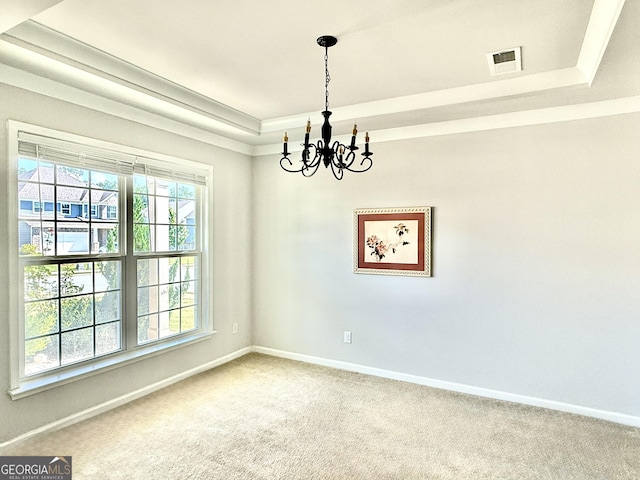 5599 Wheeler Ridge Rd, Auburn, GA 30011 - carpeted spare room featuring a chandelier and a tray ceiling